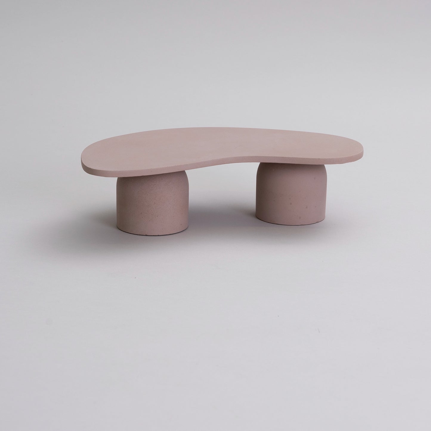 Cameo Rose concrete asymmetric table / Guer